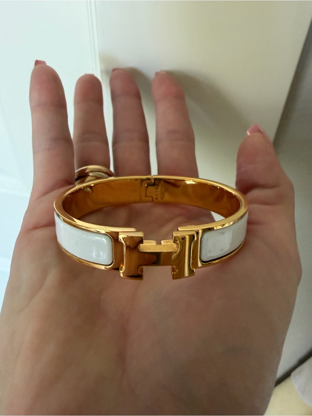 Hermès Clic H bracelet white and yellow gold-plated